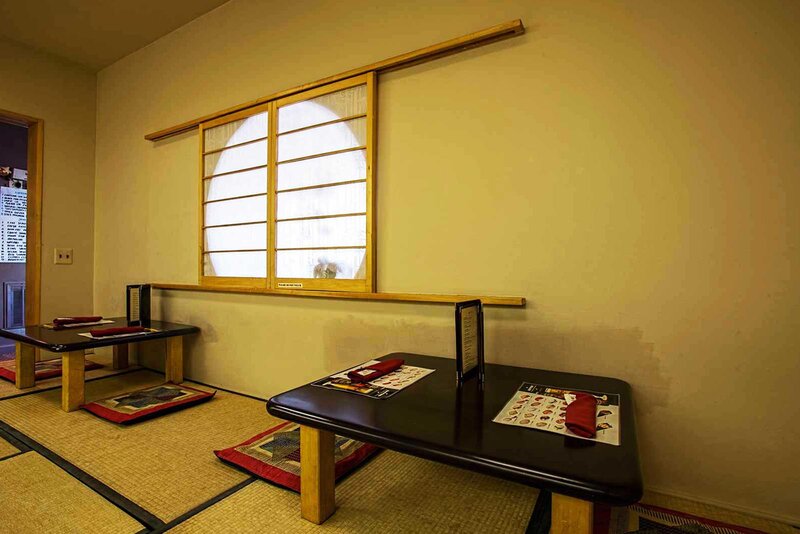 Dining room with set table seating for two